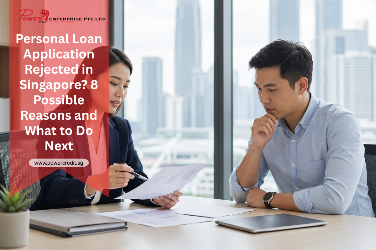 Loan consultant reviewing a personal loan application with a customer in Singapore.